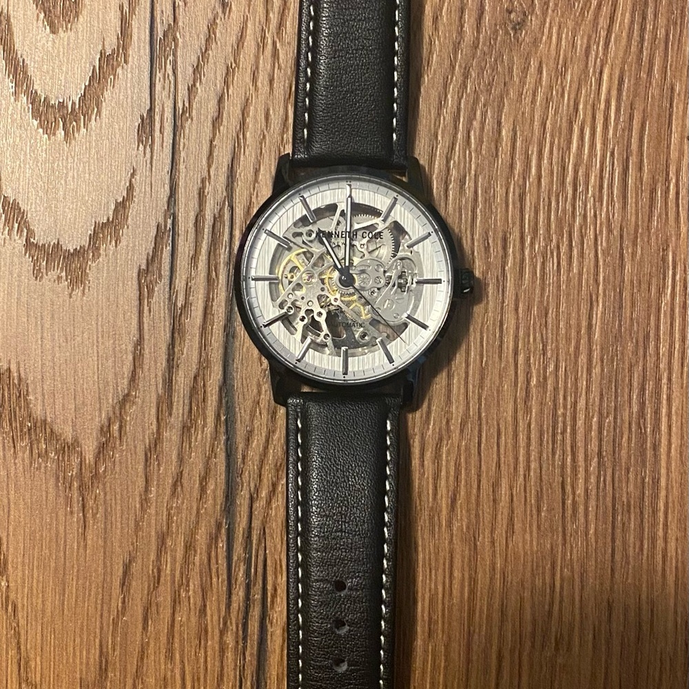Kenneth Cole Black Leather Strap Skeleton Watch with Silver Dial